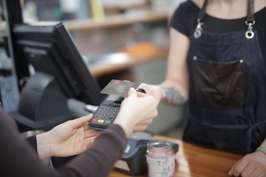 Customer using a debit card at a store