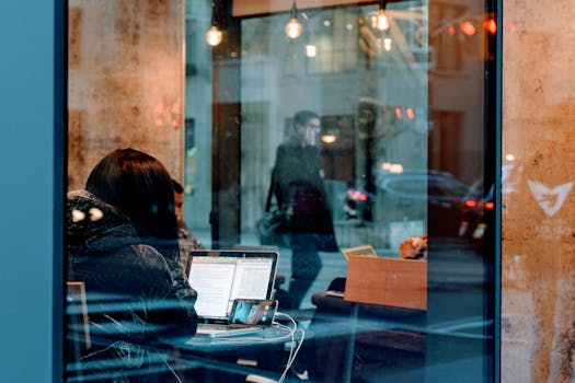 young person working at a cafe