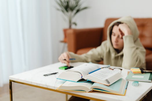 a student happily reviewing finances