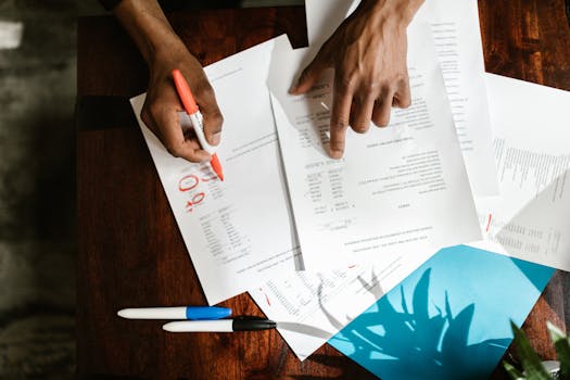 Image of a person reviewing financial documents