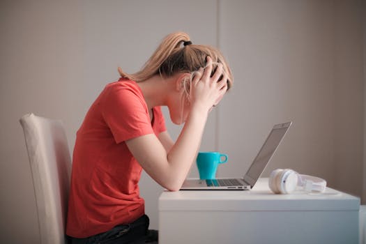 student studying with laptop