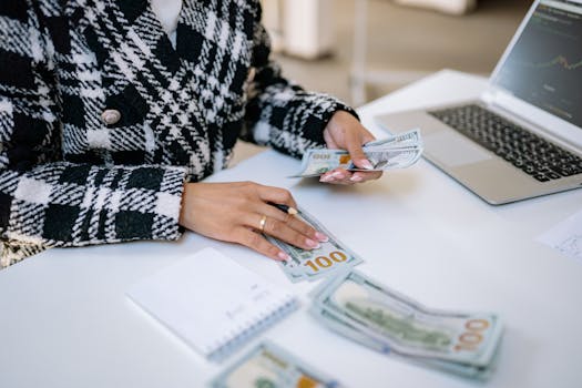 Person checking finances on a laptop