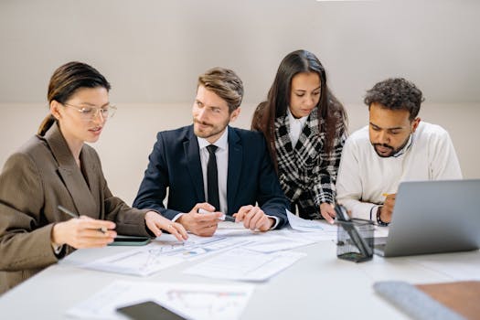 a group of students discussing finances