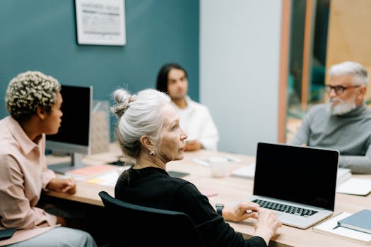 young person working on laptop